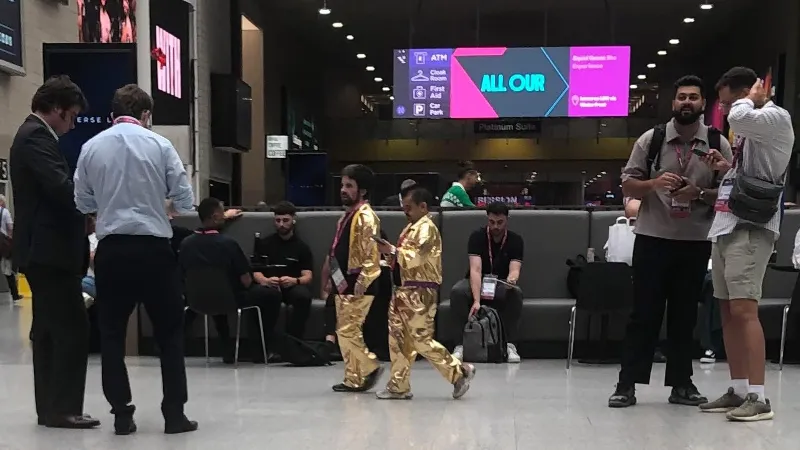 iGB Conference - people in gold costumes